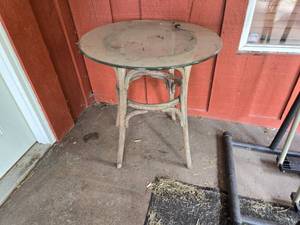lot 125 image: Glass Top Wooden Frame Patio Table