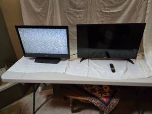 lot 311 image: 26 and 31 TVs - Both Power On