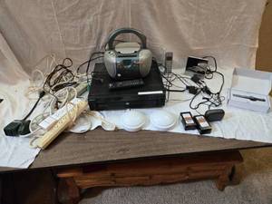 lot 334 image: DVD Player, CD Player, Power Strips, Old Phone and More