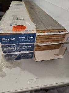lot 40 image: 6 Boxes (13.29sqftbox) Lifeproof Grovetown Oak Laminate Flooring