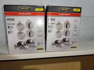 lot 53 image: 2 Boxes (2pcbox) Satin Nickel Lever Exterior Door Handles and Deadbolts