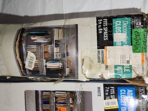 lot 35 image: 4 White Wire Closet Kits With Some Decorative Shelf Covers