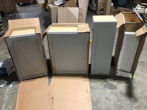 Lot of assorted cabinets various sizes and models customer returns see pictures