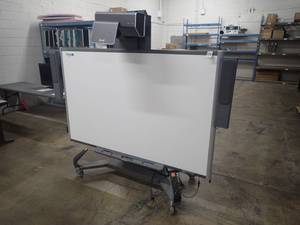 SB685 SMARTBoard  Has speakers mounted on both sides  Includes 5 markers and 3 erasers  Includes remote  Mounted on a large moving cart, 36 deep x 90 long x 80 tall&nbsp