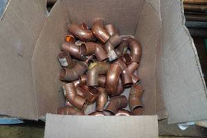 lot 134 image: 34 Copper Elbows