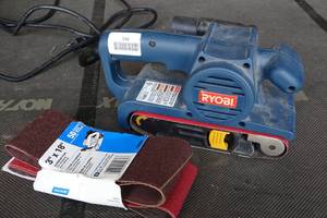 lot 246 image: Ryobi Belt Sander with Sand Paper