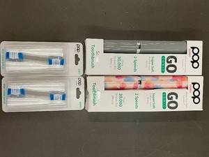 lot 280 image: Lot of POP Sonic GoSonic Toothbrushes and Replacement Brush Heads