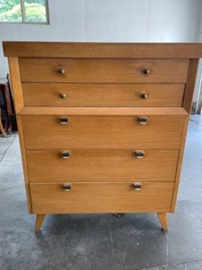 lot 21 image: Mid Century Modern Tall Blonde Style Dresser By Kent Coffey
