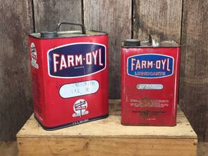 lot 53 image: 2 Vintage FARM-OYL Lubricant Cans