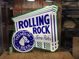 lot 66 image: Larger ROLLING ROCK Embossed Metal Sign