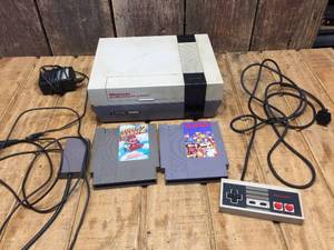 lot 84 image: Classic NES Video Game Console Set