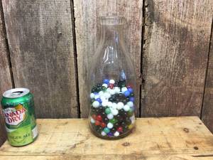 lot 89 image: Vintage Half Gallon 1892 Gramos Jar with Marbles