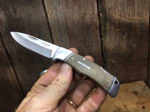 lot 107 image: Camillus Titanium Knife