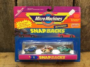 lot 129 image: Vintage Micro Machines Snap Backs #1 on Card