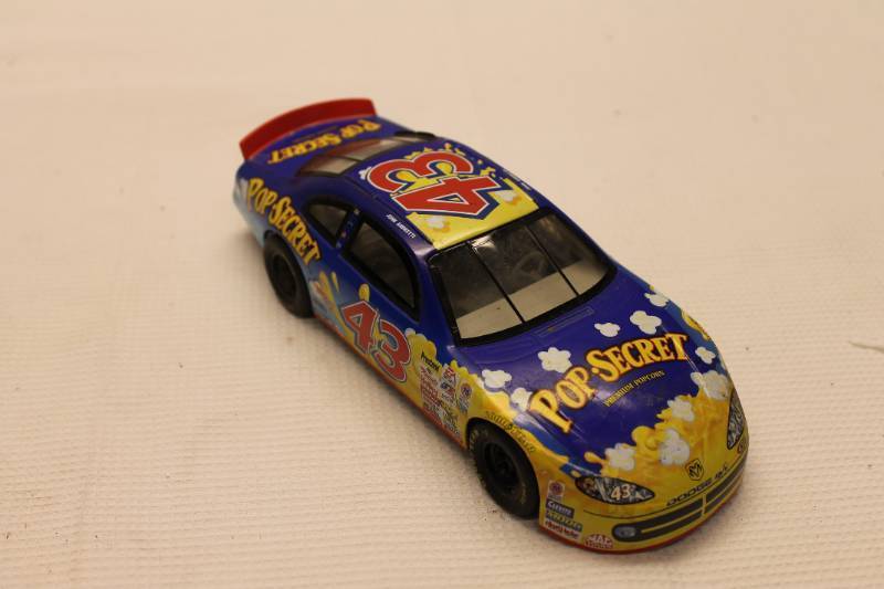 lot 69 image: John Andretti #43 Pop Secret Die-Cast Stock Car Replica - no box