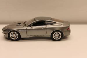 lot 8 image: Dark Silver Aston Martin 007 Bond Vanquish Diecast model