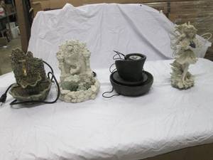 lot 10 image: Fairy statue and 3 small water foun...