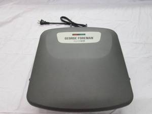 lot 32 image: George Foreman Rapid Grill. Like ne...