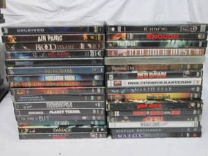 lot 53 image: 32 DVDs Terminator 2, Red Dawn, Mat...