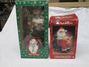 lot 58 image: 2 Amimated Santa Claus...