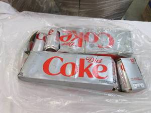 lot 177 image: 12 pack and 11 cans of Diet Coke ex...