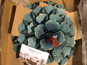 LuxenHome 23.5 in. Metal Teal Blue Round Flower Wall Decor customer return review pictures