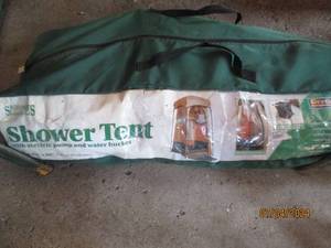 lot 21 image: Sportsmans Warehouse Shower Tent with electric pump, water bucket and misc supplies
