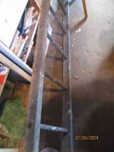 lot 27 image: 15ft straight and solid wooden ladder