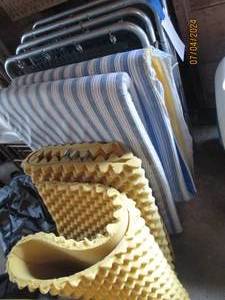 lot 33 image: Pair of fold-up camping cots with mattress pads
