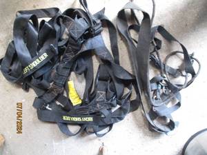 lot 43 image: Tree climbing rig with extra straps and supplies