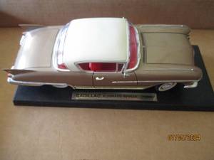 lot 14 image: Die cast model 1958 Cadillac Eldorado Seville replica car with moving parts