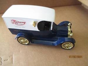 lot 78 image: Liberty Classics die cast replica bank with key 80th Anniversary Fairway Foods advertisement