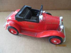 lot 81 image: Liberty Classics Die cast replica bank with key of Ford Model A with Chief Firefighter advertisement