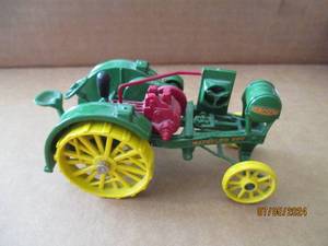 lot 83 image: Ertl Die cast replica kerosene tractor with Waterloo Boy logo