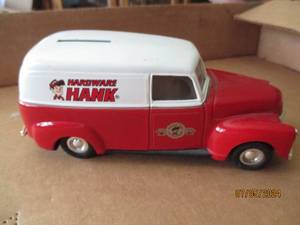 lot 86 image: Ertl Die cast replica bank with key with Hardware Hank advertisement
