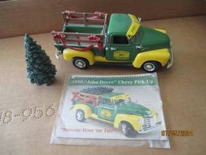 lot 100 image: Ertl Die cast replica of 1950 Chevrolet 3100 crate truck with John Deere advertisement and removable tree