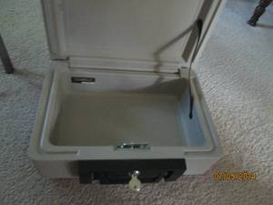 lot 110 image: Sentry 1100 fireproof safe with key...