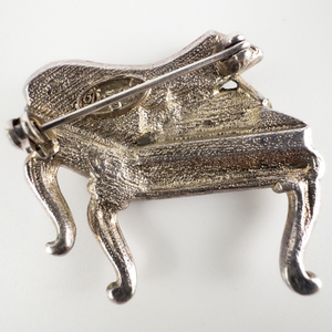 DANECRAFT Vintage Silver Tone Piano With Rhinestones Base Metal Brooch.