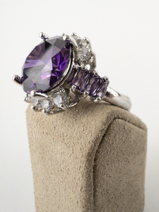 Round Cut Amethyst With CZ Partial Halo With Emerald Cut Amethyst Side Stones On Band Cocktail Silver Tone Base Metal Ring. Size 7.75 - 8.