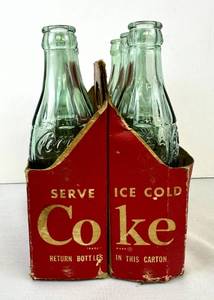 lot 68 image: Vintage Coca-Cola Bottles in Carton