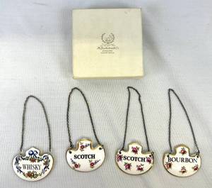 lot 69 image: Set of Four Bone China Decanter Tags