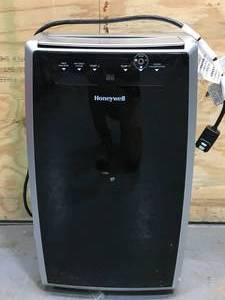 lot 138 image: Honeywell 14,000 BTU Portable Air Conditioner, Dehumidifier and Fan Model # MN4CFS0 (Retails $699.95)