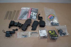 lot 56 image: Assorted Gun Accessories - Grips, Speed Loaders