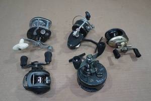lot 84 image: 5 Fishing Reels -Garcia, Daiwa, Berkley, Eagle Claw