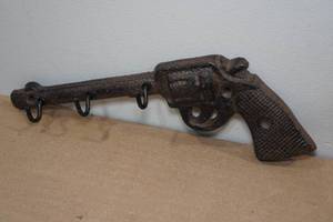 lot 109 image: Cast Iron Revolver CoatKey Rack