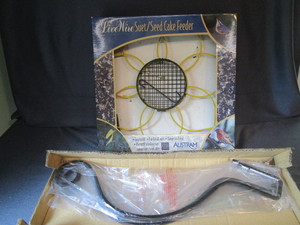 lot 25 image: Suet Holder - new, Plant Holders