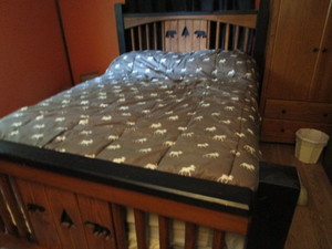 lot 1 image: Rustic Bed with Bear Cutouts