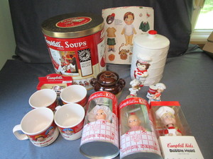 lot 170 image: Campbells Dolls, Cups, Cookie Jar, Bean Pot