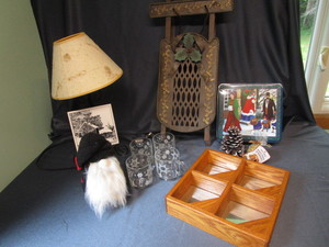 lot 317 image: Winter Sled, Pine Cones, Snowflake Glasses, Lamp, Mirrored Shelf