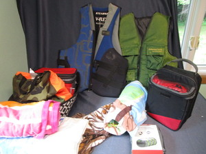 lot 324 image: Stearns Vests, Soft Sided Coolers, BeachPool Towels
